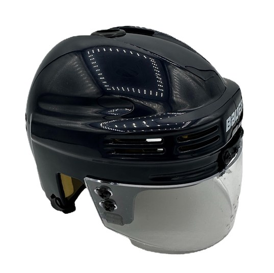 Navy Bauer mini hockey player helmet with a clear visor and a Showball eyepiece