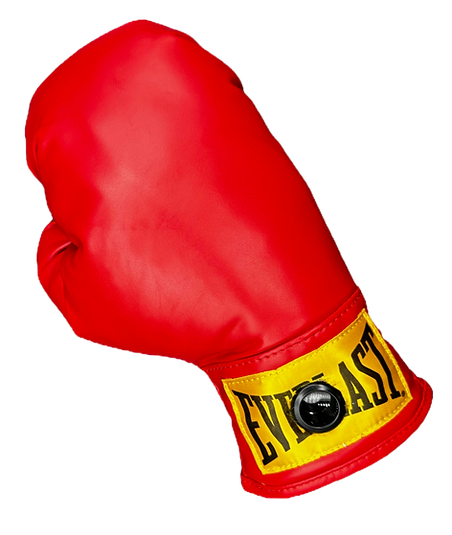 Red Showball boxing glove with a black eyepiece set into the yellow wrist cuff